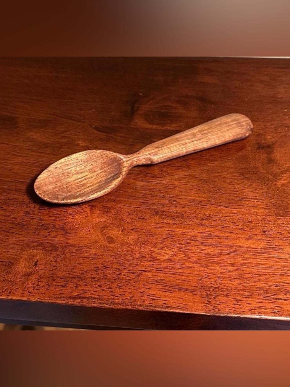 Hand carved small wooden spoon
